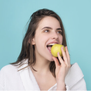 Eating apple by women